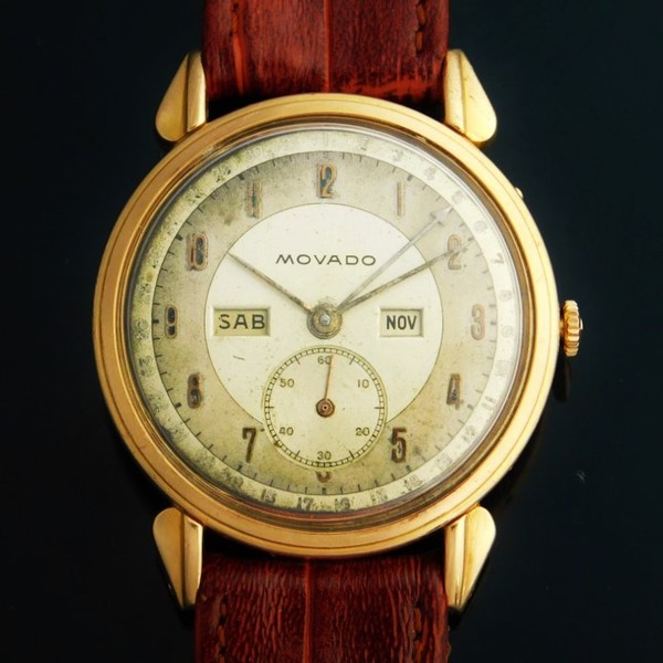 MOVADO Triple Calendar “CALENDERGRAPH” 14K Solid Gold Case – Circle  1940✩激希少14金無垢シャンパンゴールド☆トリプルカレンダー☆モバード カレンドグラフ Ref.4820☆伝説キャリバー470☆手巻き1970年代  | アンティーク時計の販売・修理・買取【クールオークション】